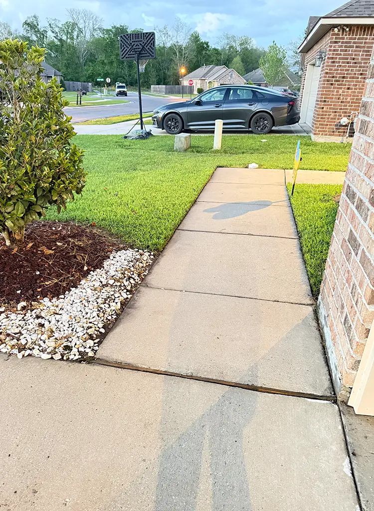 Sidewalk after pressure washing in Baton Rouge
